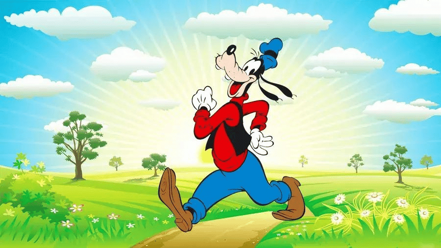 Goofy walking down a dirt path in green field.